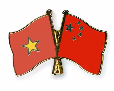 Organizaciones de masas de Vietnam y China comparten experiencias ảnh 1