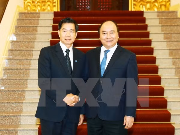 Premier de Vietnam aboga por estrechar la cooperación entre Hanoi y Vientiane ảnh 1