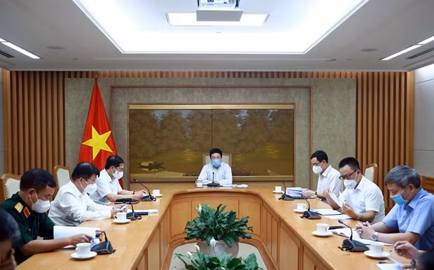 Evalúan en Vietnam resultados de implementación de la diplomacia de las vacunas ảnh 1