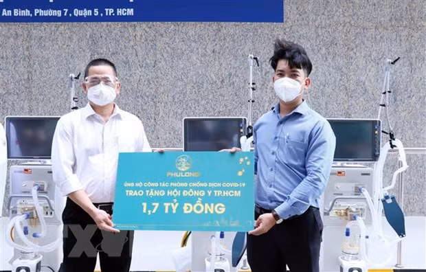 Brindan millones de porciones de comida a localidades vietnamitas en medio del COVID-19 ảnh 2