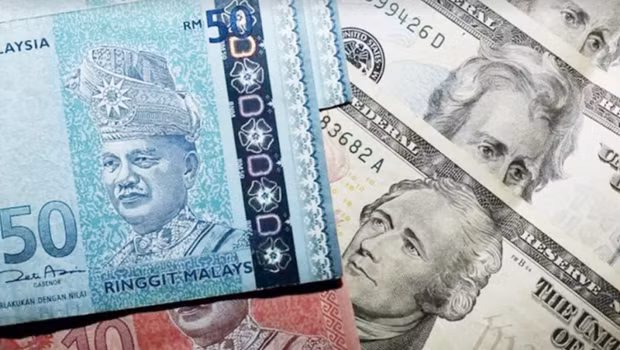 Malasia trabaja para fortalecer la moneda local ảnh 1