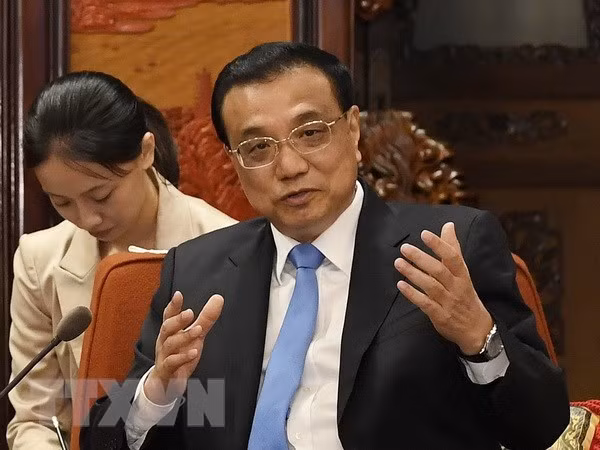  China busca elevar nivel de lazos multifacéticos con Singapur ảnh 1