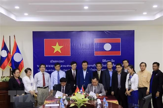 Agencia Vietnamita de Noticias amplía respaldo técnico a su similar laosiana ảnh 1 Agencia Vietnamita de Noticias amplía respaldo técnico a su similar laosiana ảnh 1
