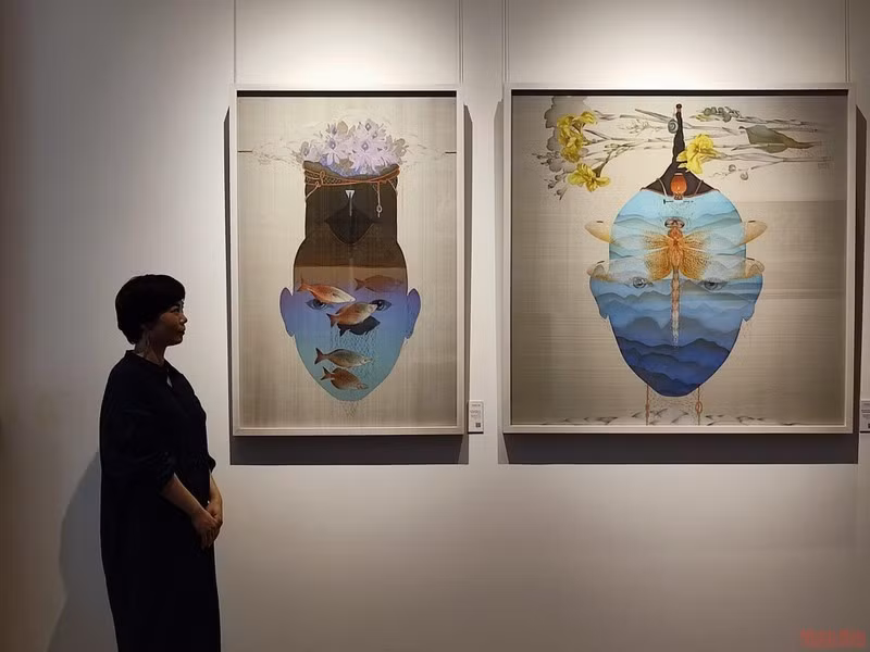 En París una exposición de pinturas resalta el arte de Vietnam ảnh 1
