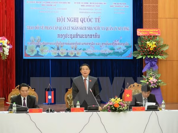Vietnam y Laos intercambian experiencias en gestión de presupuesto estatal ảnh 1