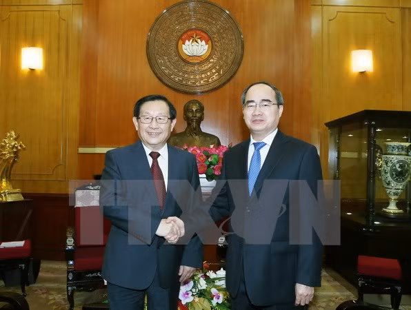 Vietnam y China fortalecen nexos entre organizaciones de masas ảnh 1