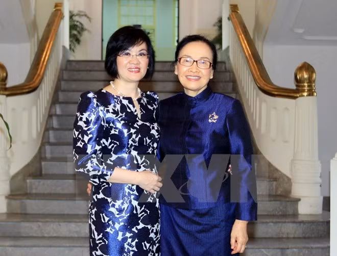  Refuerzan solidaridad mujeres vietnamitas y laosianas ảnh 1