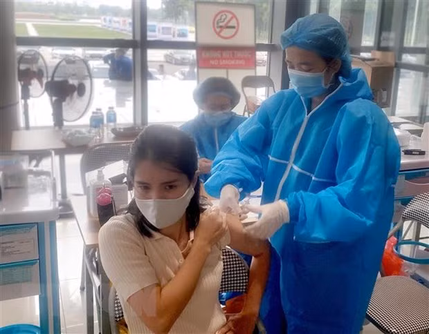 Vietnam registra 11 mil 521 casos nuevos del COVID-19 ảnh 1