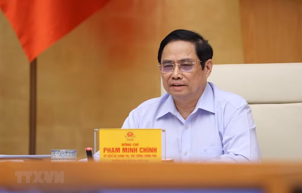 Premier vietnamita destaca importancia de lucha contra el COVID-19 a nivel de base ảnh 2