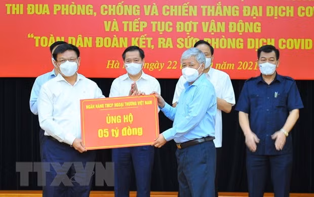 Empresas vietnamitas unen esfuerzos en lucha contra el COVID-19 ảnh 1