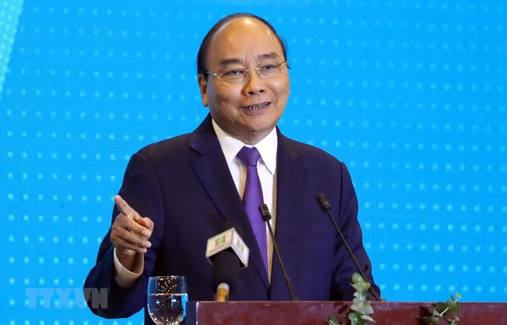 Premier vietnamita participa en conferencia ¨Hanoi 2020- Cooperación, Inversión y Desarrollo¨ ảnh 1