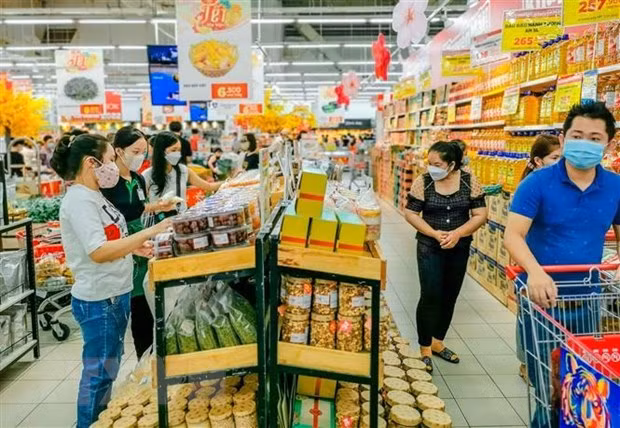 Productores de alimentos de Vietnam bajo presión para mantener los precios bajos ảnh 1