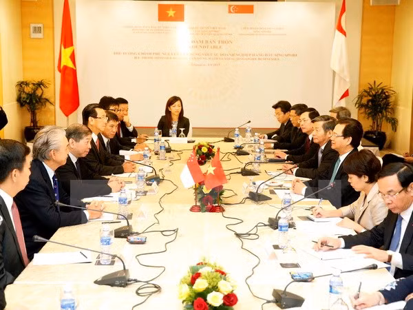 Concluye premier vietnamita visita a Malasia y Singapur ảnh 1