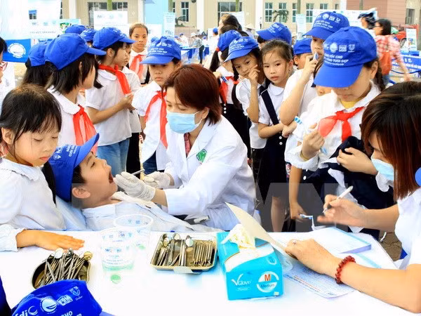 Más del 90 por ciento de vietnamitas presentan problemas dentales ảnh 1