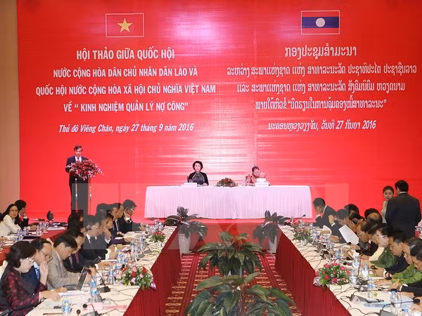 Vietnam y Laos comparten experiencias en la gestión de deuda pública ảnh 1