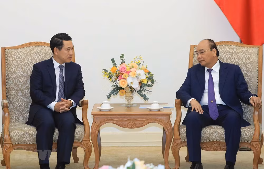 Recibe primer ministro de Vietnam al canciller laosiano ảnh 1