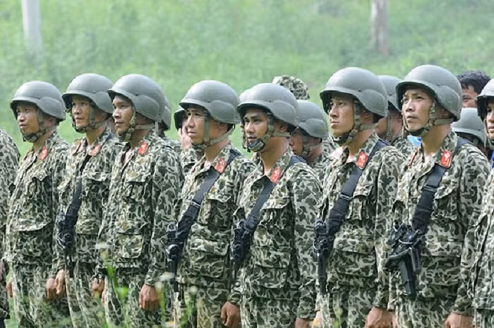 Fuerzas de seguridad de Vietnam y Laos impulsan cooperación ảnh 1