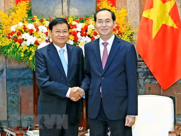 Presidente de Vietnam y primer ministro de Laos se entrevistan en Hanoi ảnh 1