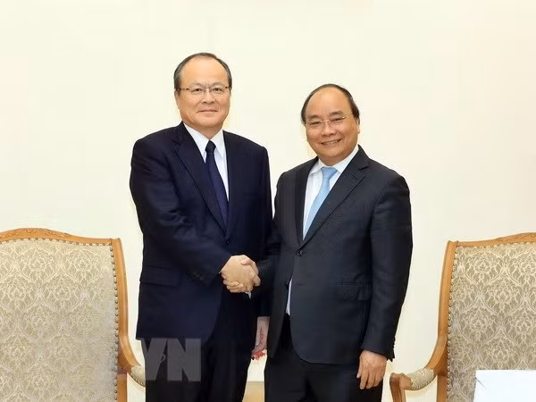 Primer ministro de Vietnam recibe a ejecutivo del Grupo Mitsubishi ảnh 1