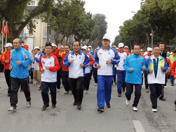 Localidades vietnamitas responden al Día de la Carrera Olímpica por la Salud Pública ảnh 1