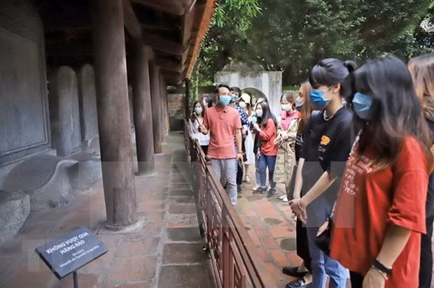 Lista Hanoi para prevenir y controlar el COVID-19 en todos los niveles ảnh 2
