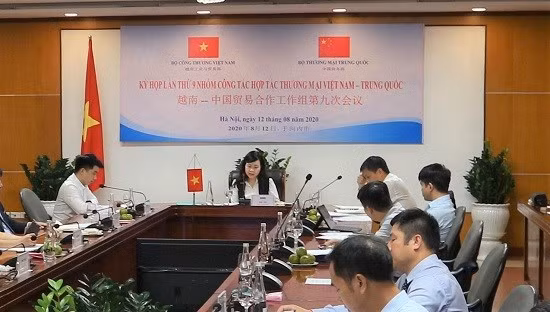 Debaten medidas para impulsar cooperación comercial Vietnam-China ảnh 1