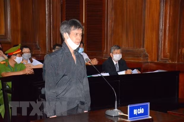 Enjuician en Vietnam a acusados por delitos contra el Estado ảnh 1