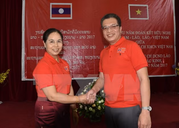 Embajadas de Vietnam y Laos en China celebran aniversario de sus lazos diplomáticos ảnh 1