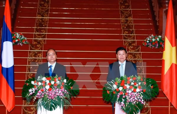 Premier Thongloun Sisoulith: Relación Laos- Vietnam es tesoro común de ambos pueblos ảnh 1