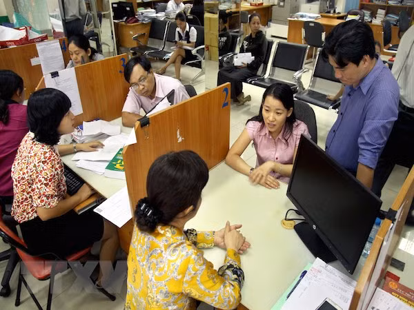 Exhortan a unidades arancelarias de Hanoi a respaldar a negociantes ảnh 1