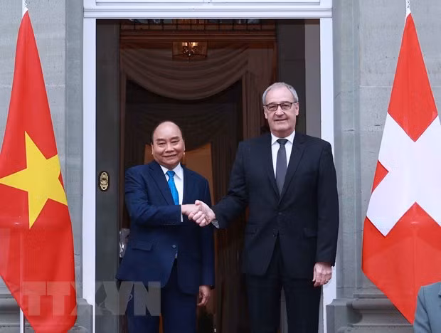 Resaltan éxito de visitas oficiales del presidente vietnamita a Suiza y Rusia ảnh 1