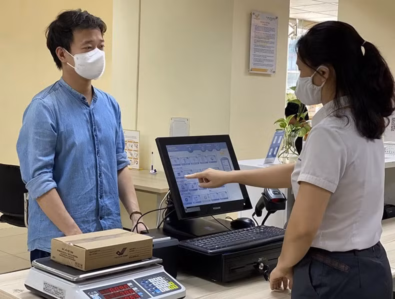 Florecen actividades del mercado postal en Vietnam ảnh 2