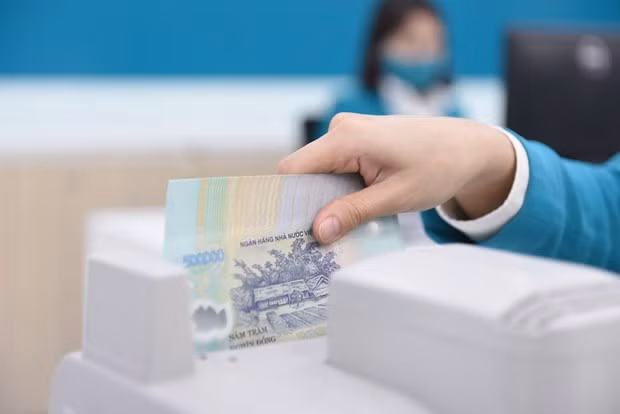 Bancos vietnamitas esperan gran beneficio en 2022 ảnh 1