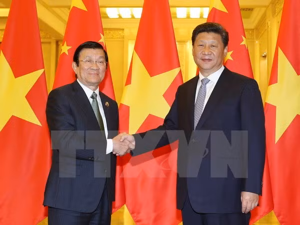 En Beijing se reúnen Truong Tan Sang y Xi Jinping ảnh 1