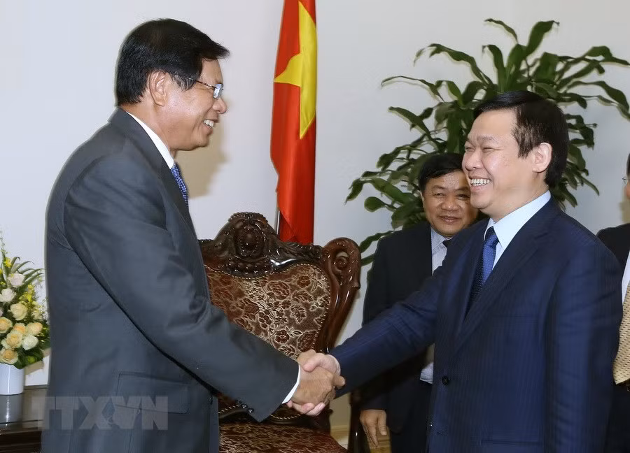 Intercambia Vietnam con Laos experiencias en construcción de modelos económicos colectivos ảnh 1