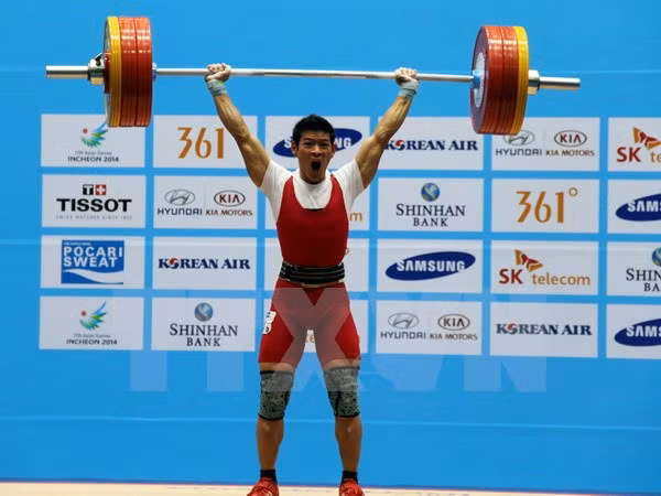 Enviará Vietnam tres atletas de halterofilia a juegos olímpicos 2016 ảnh 1
