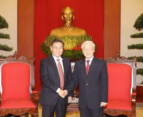 Líder partidista de Vietnam se reúne con jefe de organización de masas de Laos ảnh 1