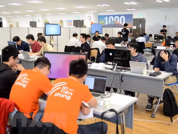 Equipos de Vietnam y Japón compiten en concurso de programación de inteligencia artificial ảnh 1