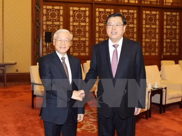 Líder partidista de Vietnam se reúne con titular de la Asamblea Popular Nacional de China ảnh 1