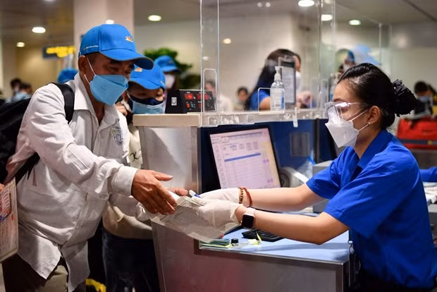 Vietnam Airlines respalda a trabajadores necesitados en el retorno casa en ocasión del Tet ảnh 1