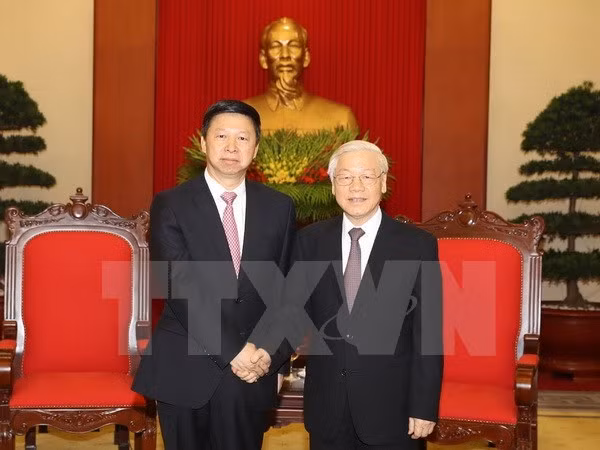  Secretario general de PCV recibe a enviado especial de máximo dirigente partidista de China ảnh 1