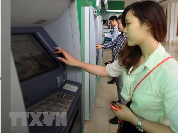 Aplicación de avances tecnológicos atribuye al aumento de pago en cajeros automáticos en Vietnam ảnh 1