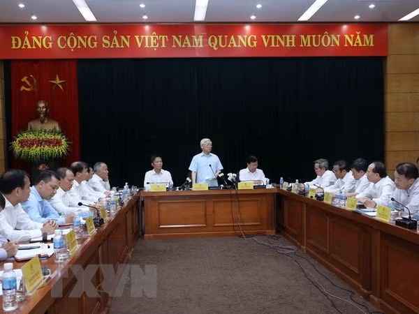 Secretario general del PCV intercambia con el Ministerio vietnamita de Industria y Comercio ảnh 1