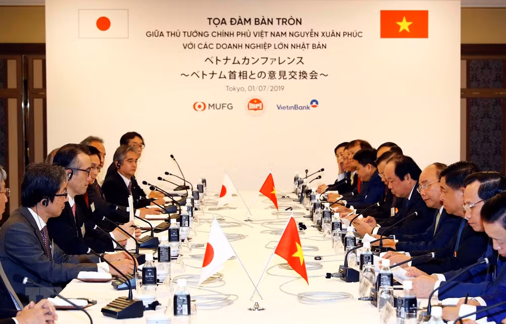 Dialoga primer ministro vietnamita con líderes de empresas japonesas ảnh 1