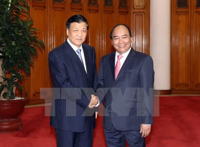 Vietnam concede importancia a amistad y asociación de cooperación con China ảnh 1