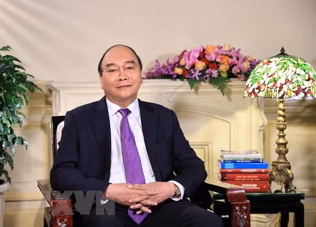 Mensaje del Presidente por el 20 aniversario del Día de la Familia de Vietnam ảnh 1