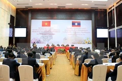 Vietnam y Laos acuerdan intercambiar experiencias sobre movilización de masas