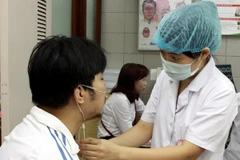 Expertos vietnamitas e internacionales intercambian sobre tratamiento de enfermedades respiratorias