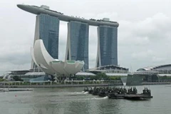China y Singapur abogan por multilateralismo y libre comercio