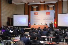 Vietnam y Laos intercambian experiencias en la movilización de masas